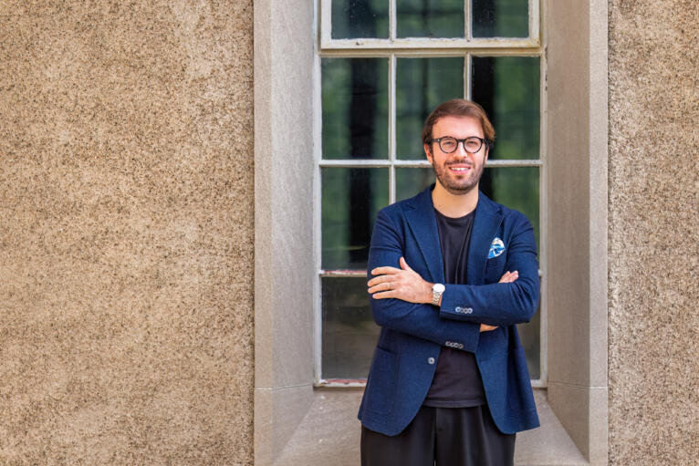 Carmello Ignacollo standing at window at Adolphus Busch Hall